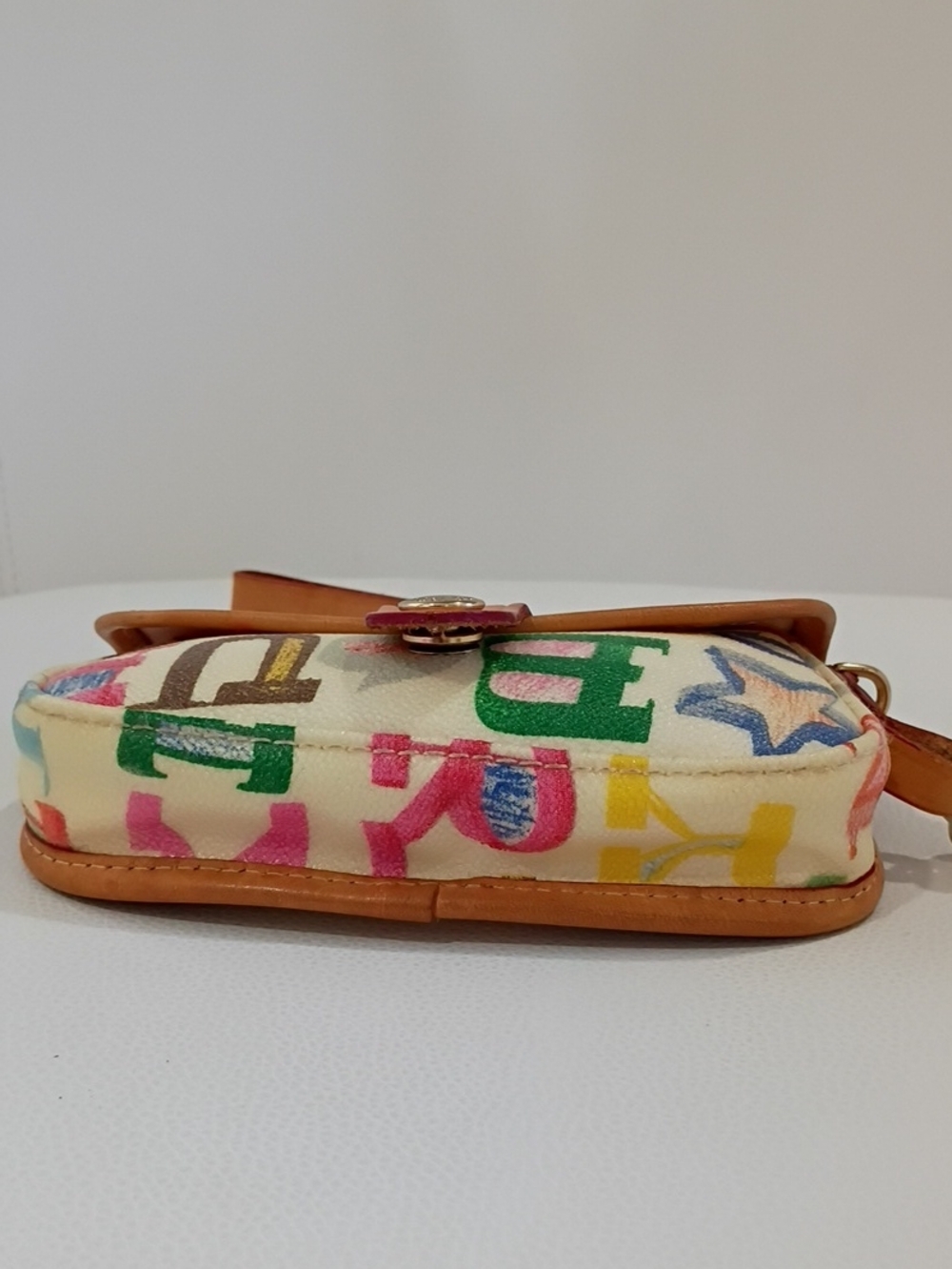 Dooney & Bourke VintageMulticolor Logo Wristlet - White Background with Tan Trim - Picture 5 of 6
